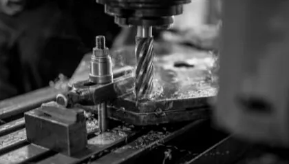 CNC milling a part held in a vise