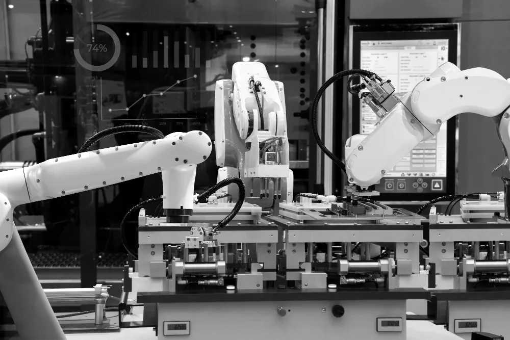 Robots loading parts in an automated machining cell